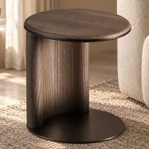 luxury side table Dubai A fully wooden side table with a sculptural design that fuses smooth contours with structural integrity. \n Its clean architectural lines highlight the natural beauty of the wood grain, bringing visual calm and luxury into any room. \n