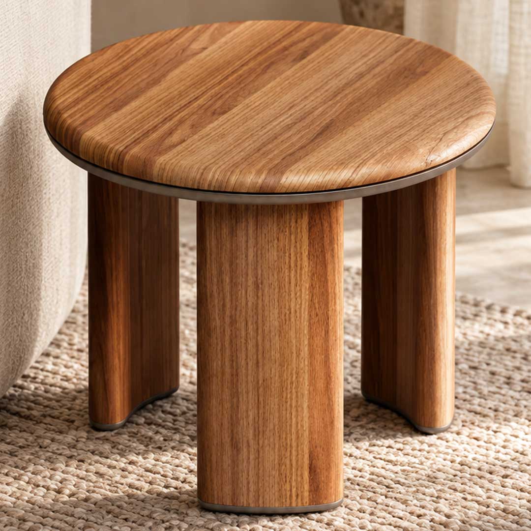 Luxury side table UAE Dubai Elegant walnut side table with sculptural base and metallic warmth, perfect for modern UAE interiors. \n