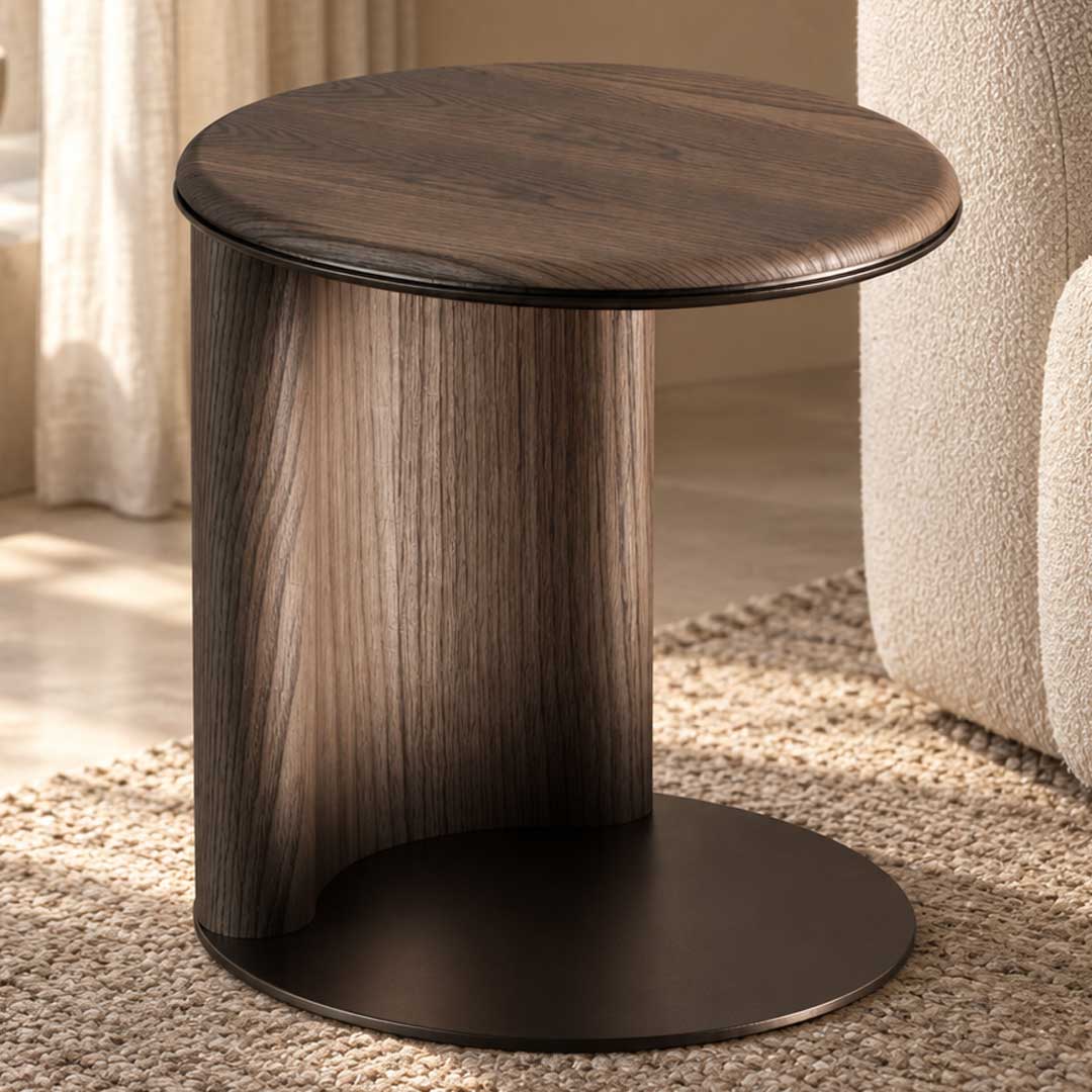 luxury side table Dubai A fully wooden side table with a sculptural design that fuses smooth contours with structural integrity. \n Its clean architectural lines highlight the natural beauty of the wood grain, bringing visual calm and luxury into any room. \n