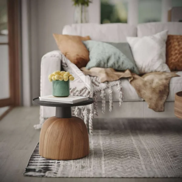 Luxury modern side table with a dark wood top and sculpted natural wood base, styled in a cozy living room with a beige sofa and decorative cushions – ideal for elegant interiors in the UAE. طاولة جانبية فاخرة بتصميم عصري، سطح من الخشب الداكن وقاعدة منحوتة من الخشب الطبيعي، موضوعة في غرفة معيشة دافئة مع أريكة بيج ووسائد ديكورية – مثالية للديكورات الراقية في الإمارات. Ask ChatGPT