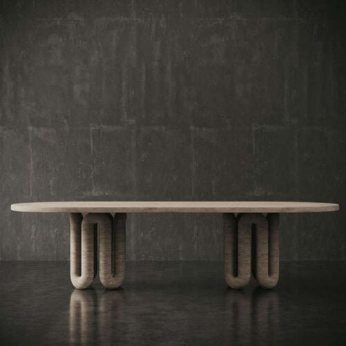 Side profile of oval travertine dining table with unique sculpted legs, ideal for contemporary UAE homes. منظر جانبي لطاولة طعام بيضاوية من الترافرتين بأرجل منحوتة فريدة، مثالية للمنازل العصرية في الإمارات.