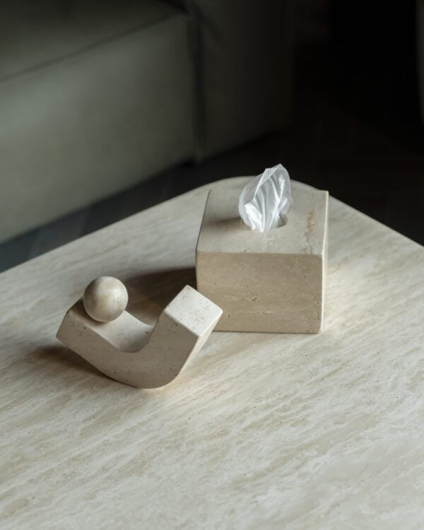 Sculpture in luxury beige travertine – a modern decorative stone accessory with a curved base and sphere, perfect for UAE designer interiors.
