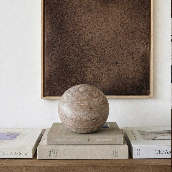 "Handcrafted Luna Sphere ball in natural travertine stone – premium decorative accessory for luxury homes in the UAE" "كرة لونا سڤير مصنوعة يدوياً من حجر الترافرتين الطبيعي – إكسسوار ديكوري فاخر للمنازل الفاخرة في الإمارات"
