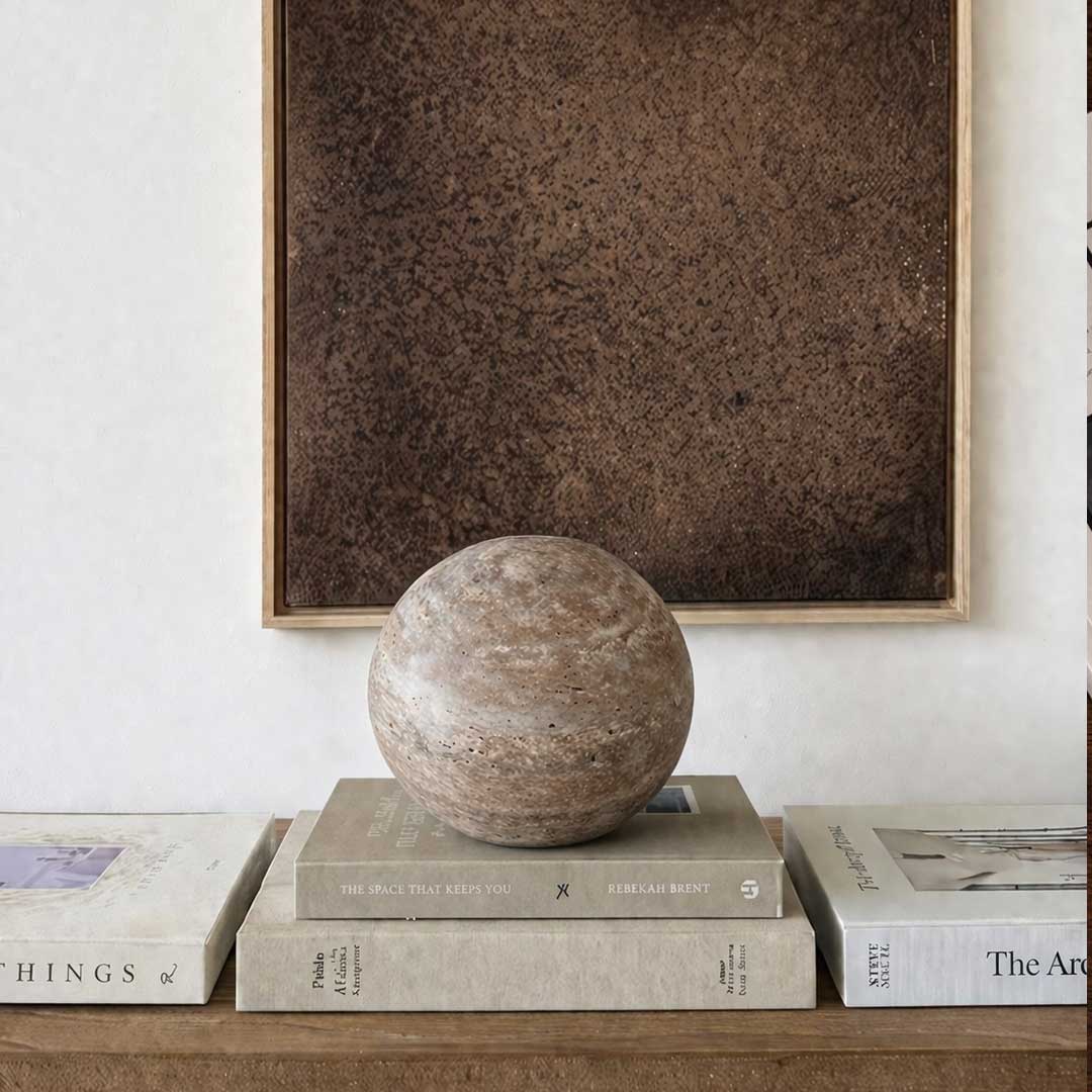 "Handcrafted Luna Sphere ball in natural travertine stone – premium decorative accessory for luxury homes in the UAE" "كرة لونا سڤير مصنوعة يدوياً من حجر الترافرتين الطبيعي – إكسسوار ديكوري فاخر للمنازل الفاخرة في الإمارات"