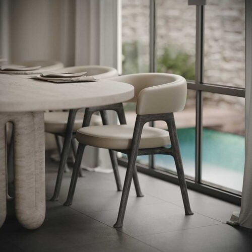 Luxury dining table with sculptural marble base and premium upholstered dining chairs featuring curved backrests and solid wood legs by Conceptual. This high-end dining set blends modern elegance with exceptional comfort, ideal for homeowners, interior designers, and property developers searching for luxury dining chairs and dining tables in Dubai, Abu Dhabi, and across the UAE.