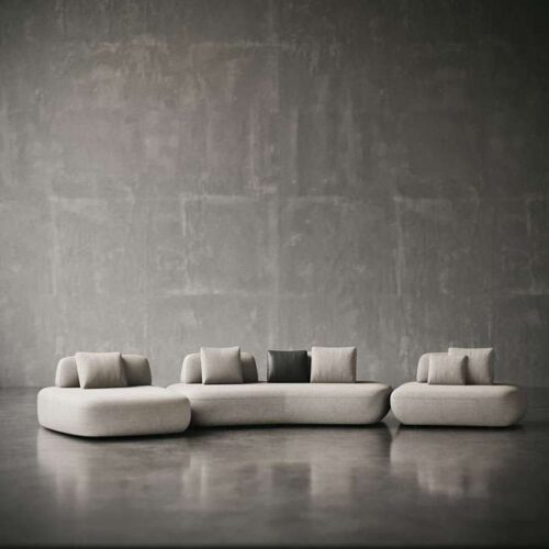 traight-on view of Sereno Slate Sofa with soft curves and modern neutral palette. منظر أمامي مباشر لكنبة سيرينو سلايت بخطوط ناعمة ولوحة ألوان حيادية عصرية.