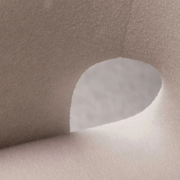 Close-up detail of Aether Pearl Dining Chair fabric – soft beige textured upholstery showcasing refined craftsmanship and luxurious material finish for premium interiors in Dubai and Abu Dhabi, UAE