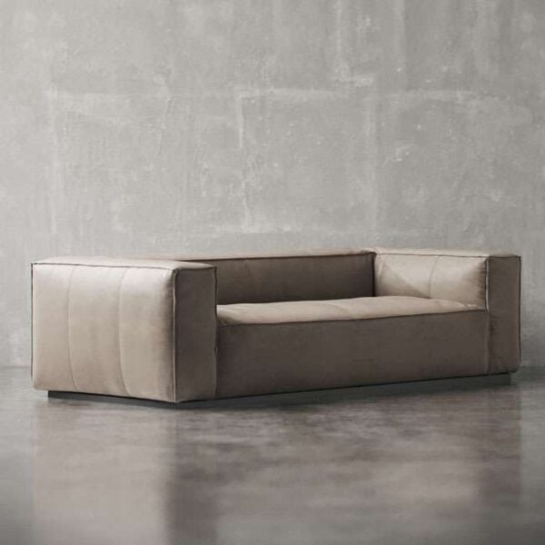 Luxury beige fabric sofa with bold structure and minimalist design – ideal for modern UAE apartments كنبة قماشية فاخرة بلون بيج بتصميم جريء وبسيط – مثالية للشقق العصرية في الإمارات