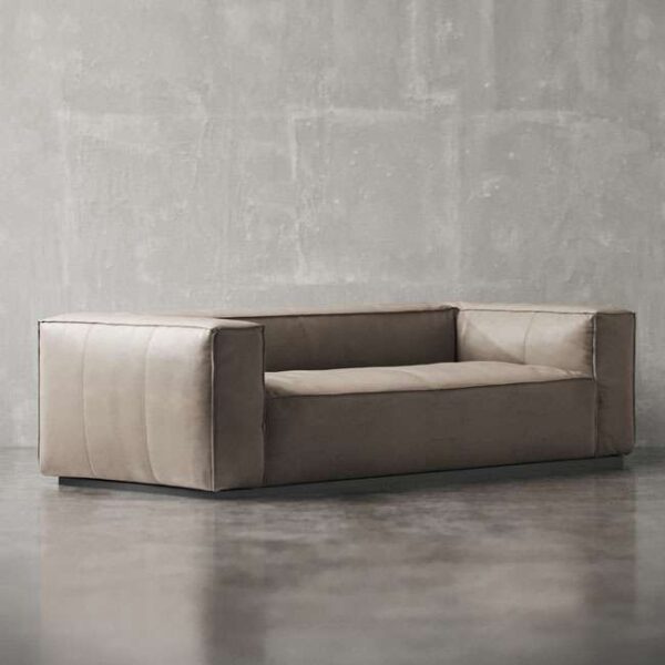 Luxury beige fabric sofa with bold structure and minimalist design – ideal for modern UAE apartments كنبة قماشية فاخرة بلون بيج بتصميم جريء وبسيط – مثالية للشقق العصرية في الإمارات