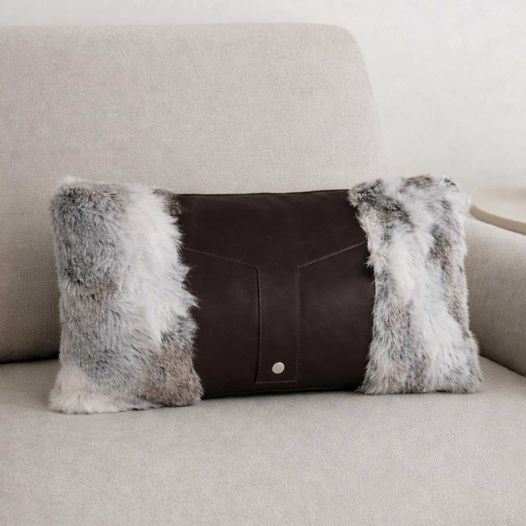 Silver Ridge Luxe Cushion in genuine rabbit fur and premium leather – luxury rectangular cushion for modern UAE interiors "وسادة سيلفر ريدج لوكس من فرو الأرنب الطبيعي والجلد الفاخر – وسادة مستطيلة فاخرة للديكورات العصرية في الإمارات."