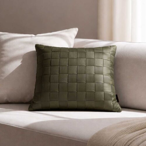Luxury Zelora woven leather cushion in olive green, modern square design for contemporary interiors in UAE. وسادة زيلورا فاخرة من الجلد باللون الزيتوني، بتصميم مربع منسوج، مثالية للديكور العصري في الإمارات.