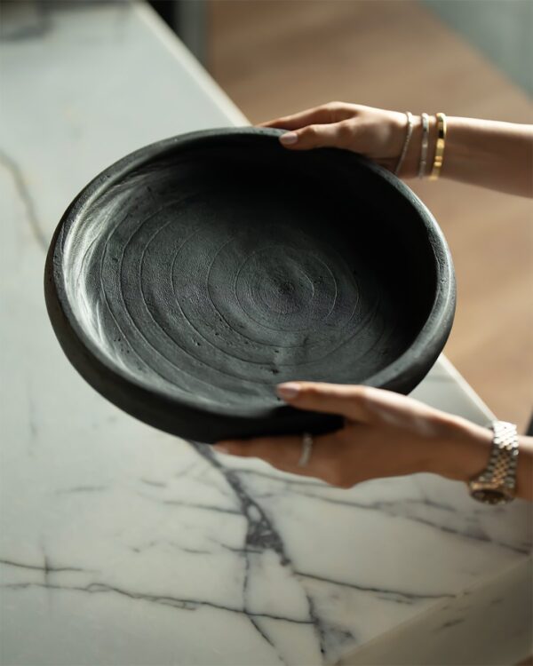 Plate from natural wood in balck in the UAE