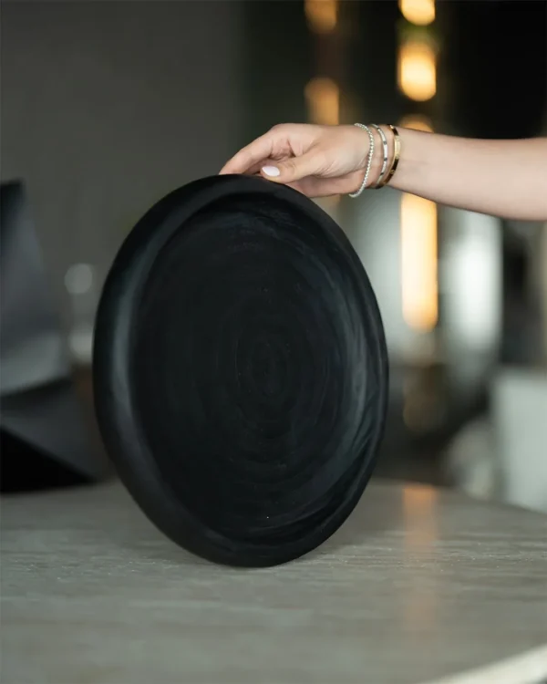 Plate from natural wood in balck in the UAE