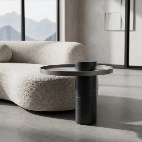 Luxury Bravura Luno Side Table crafted with a black marble cylindrical base and brushed metal top, showcasing elegant modern furniture design available in Dubai and Abu Dhabi, UAE.