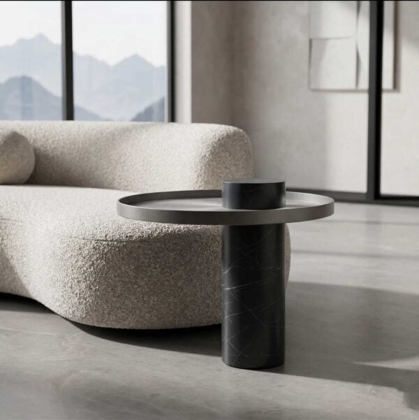 Luxury Bravura Luno Side Table crafted with a black marble cylindrical base and brushed metal top, showcasing elegant modern furniture design available in Dubai and Abu Dhabi, UAE.