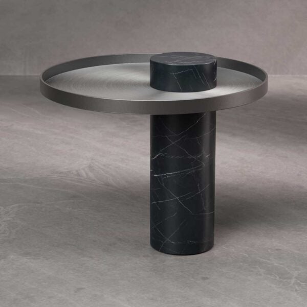 Luxury Bravura Luno Side Table crafted with a black marble cylindrical base and brushed metal top, showcasing elegant modern furniture design available in Dubai and Abu Dhabi, UAE.