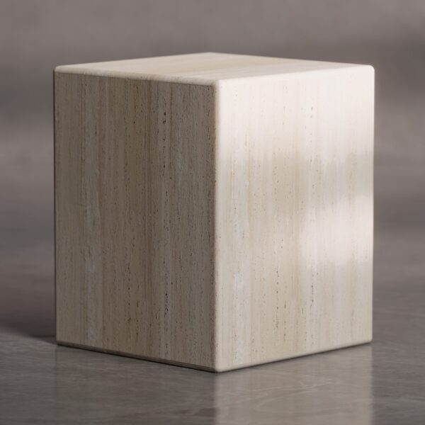 Elegant Lunet Side Table crafted from natural beige travertine stone, featuring a minimalist cube design ideal for modern luxury interiors in Dubai and Abu Dhabi.