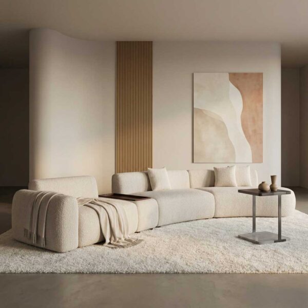 High-end luxury sofa with an elegant side table in a refined modern interior, highlighting premium contemporary furniture for homes in Dubai and Abu Dhabi.