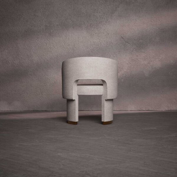 Rear view of Althea luxury dining chair with a smooth curved backrest, open-back detail, and sculptural base with gold-finished accents – elegant dining furniture UAE المنظر الخلفي لكرسي طعام ألفيا الفاخر بظهر منحني سلس، وتصميم مفتوح من الخلف، وقاعدة نحتية بتشطيب ذهبي – أثاث طعام أنيق في الإمارات