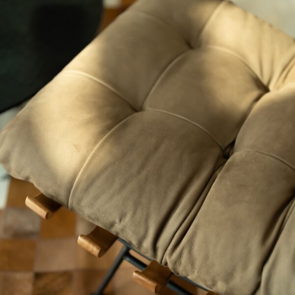Detailed close-up of the Chancellor Lounge Chair cushion, highlighting the soft beige suede texture, fine stitching, and natural light reflection — emphasizing luxury comfort and craftsmanship for premium interiors in Dubai and Abu Dhabi.