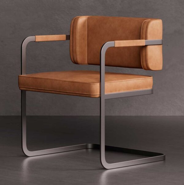 Ironhide Dining Chair — a modern industrial-style dining chair with a sleek metal frame and plush tan leather upholstery, designed for sophisticated dining spaces in Dubai and Abu Dhabi.