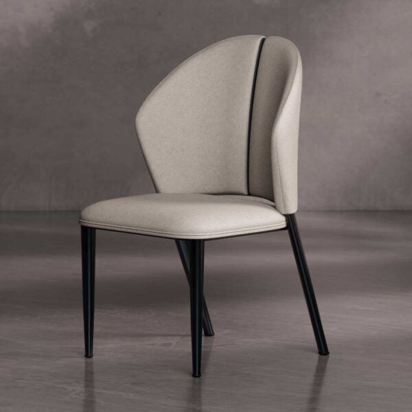 Ovara Dining Chair — a contemporary designer dining chair featuring a sculpted backrest with soft beige upholstery and sleek black tapered legs, perfect for elegant dining spaces in Dubai and Abu Dhabi.