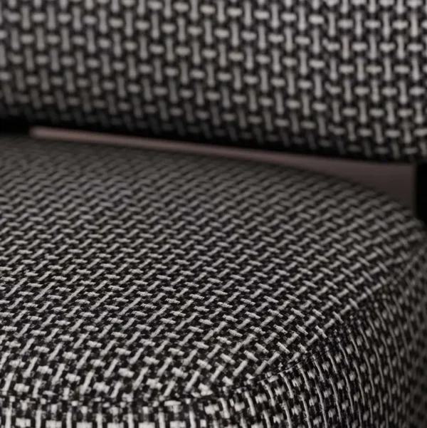 Close-up of the Selden Lounge Chair’s premium textured upholstery in a black and white woven pattern, highlighting its refined craftsmanship and luxurious material.