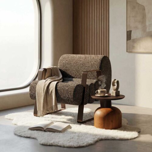 Luxury designer lounge chair featuring sculptural curved form, textured premium upholstery, and solid wood armrests with a contemporary architectural base. Styled in a modern minimalist interior, this statement lounge chair offers exceptional comfort and refined elegance—perfect for interior designers, property developers, and homeowners searching for high-end lounge chairs in Dubai, UAE. Ideal for luxury villas, upscale apartments, hospitality projects, and sophisticated living spaces across the Emirates.