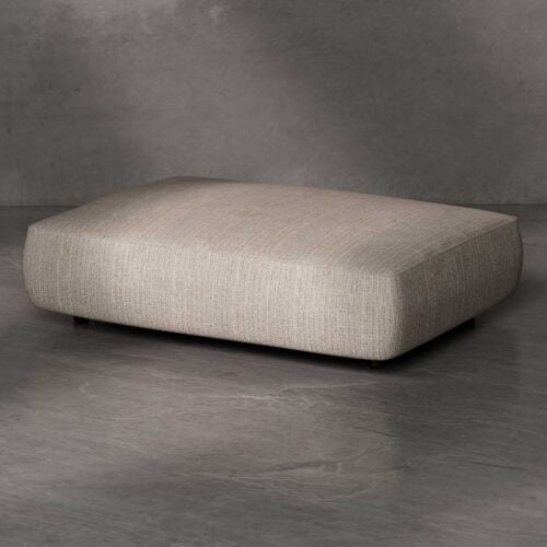 Modern beige ottoman with minimalist design and elegant upholstery a luxury furniture piece for contemporary interiors by a premium brand in Dubai and Abu Dhabi, UAE