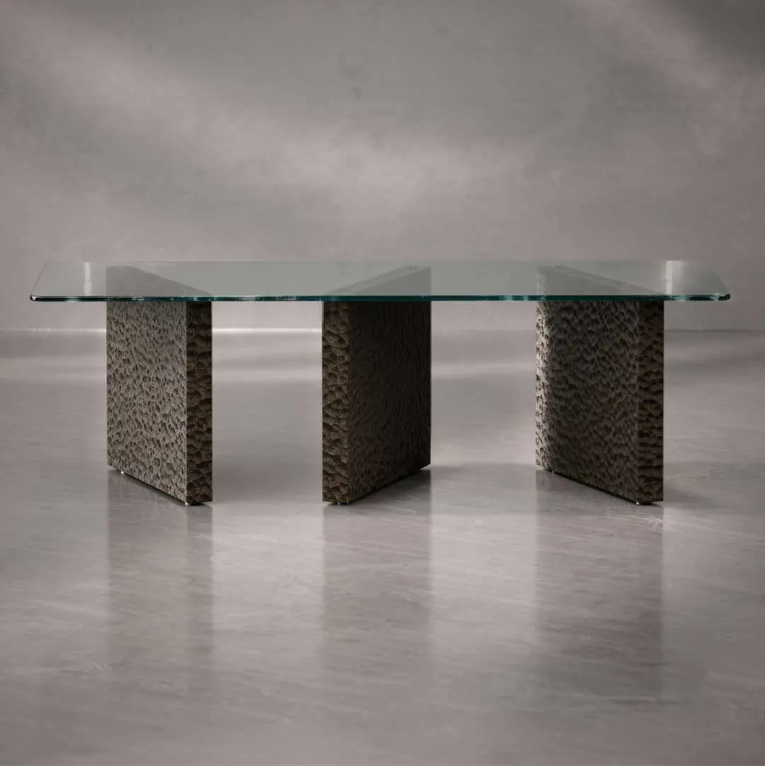 Full view of the Caelus designer dining table with glass top and sculpted wooden base, a statement luxury furniture piece in Dubai and Abu Dhabi.