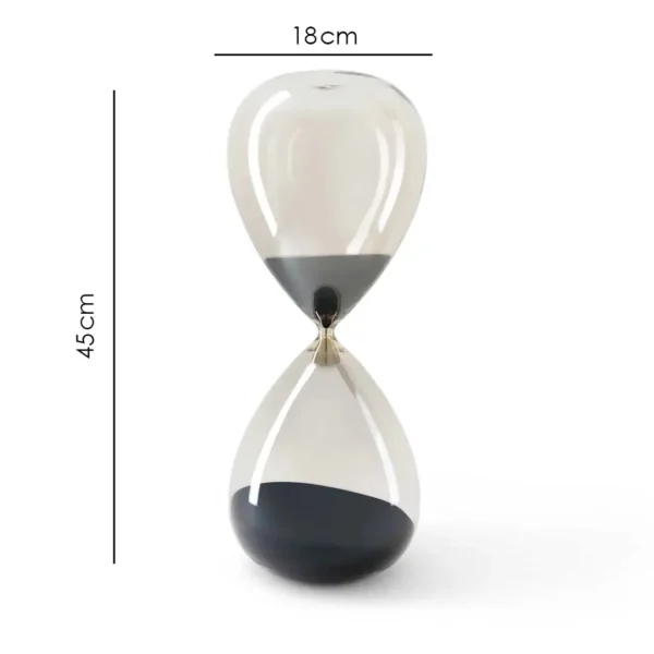 Luxury Dusk Hourglass Grande made of premium glass with warm sand-colored grains, 45cm tall and 18cm wide décor piece, elegant minimalist accessory for modern interiors in Dubai and Abu Dhabi, UAE.