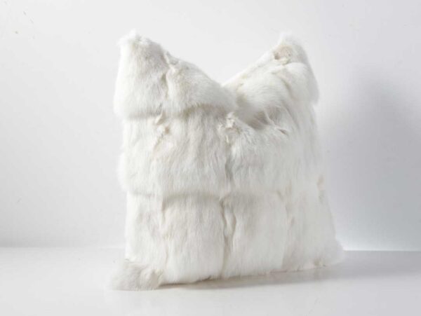Side view of Lysva Cushion showing plush white fox fur texture and voluminous design for luxury décor in UAE