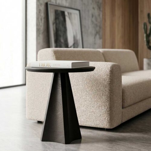 Lenora Alto black oak side table with round top and sculptural base — elegant minimalist furniture piece for modern living spaces in Abu Dhabi, UAE.