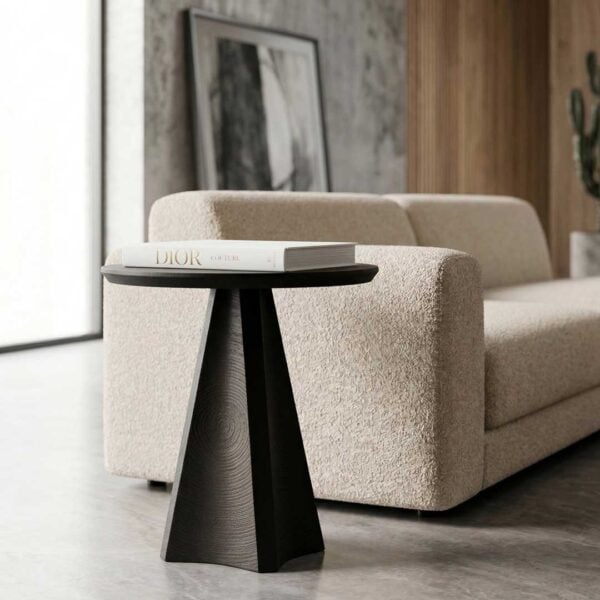 Lenora Alto black oak side table with round top and sculptural base — elegant minimalist furniture piece for modern living spaces in Abu Dhabi, UAE.