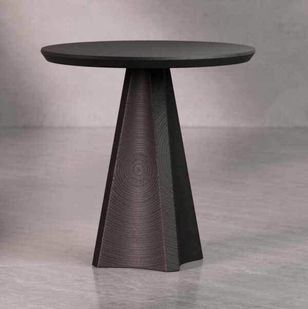 Lenora Alto black oak side table with round top and sculptural base — elegant minimalist furniture piece for modern living spaces in Abu Dhabi, UAE.
