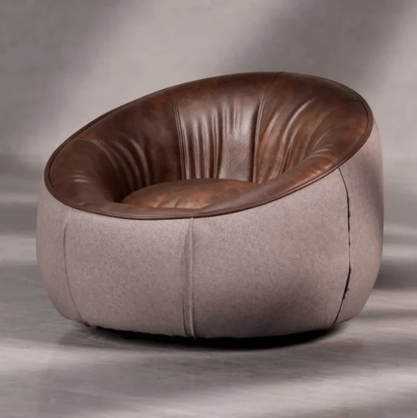 Full view of Opulent Lounge Chair in interior setting soft grey velvet and polished metal base in Dubai luxury home.
