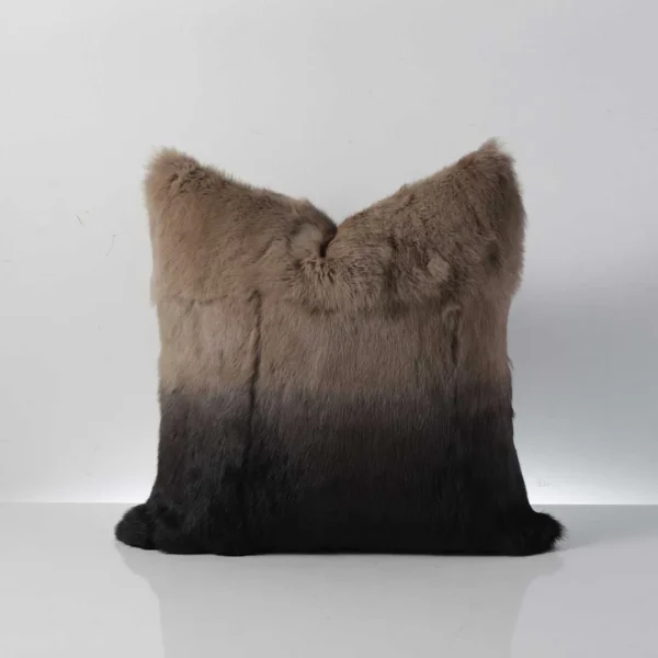 Front view of Velmira luxury fur cushion in brown and black gradient tones, symbolizing modern elegance in UAE interiors.