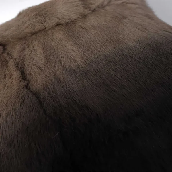 Detailed texture of Velmira rabbit hair cushion in gradient brown and black tones, reflecting luxury craftsmanship in the UAE.