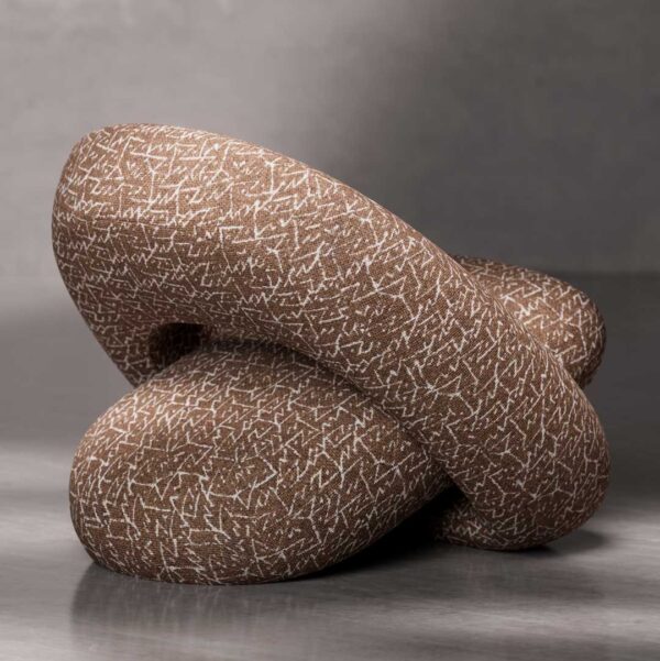 Sculptural side view of Zen Lounge Chair highlighting its fluid, organic curves and fully upholstered base. This high-end designer lounge chair adds architectural elegance and comfort to luxury residential and hospitality projects in the UAE.