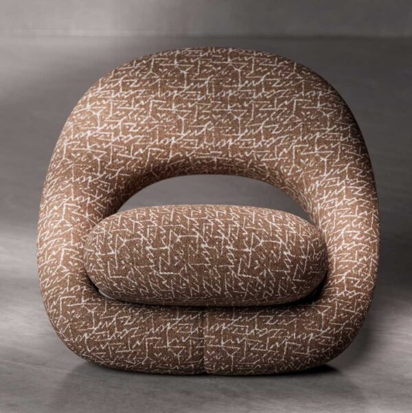 Front view of Zen Lounge Chair featuring a soft curved frame and low-profile cushioned seat in textured bouclé upholstery. A statement luxury lounge chair designed for modern villas, upscale apartments, and designer interiors in Dubai and Abu Dhabi, UAE.