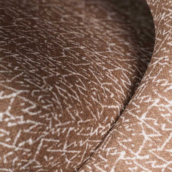 Close-up of Zen Lounge Chair upholstered in abstract jacquard bouclé fabric, showcasing rich texture and premium craftsmanship. This high-end lounge chair is perfect for interior designers and developers seeking luxury seating solutions in Dubai and across the UAE.