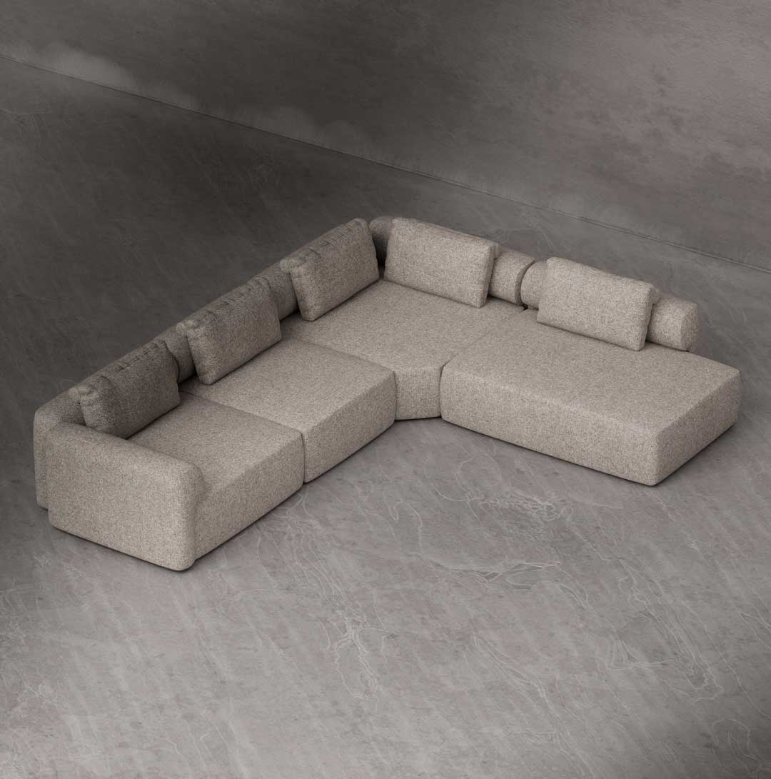 Luxury modular L-shape sofa with deep seating and architectural boxy design, upholstered in textured fabric and configured as a modern corner sofa for premium living spaces in Dubai and the UAE.