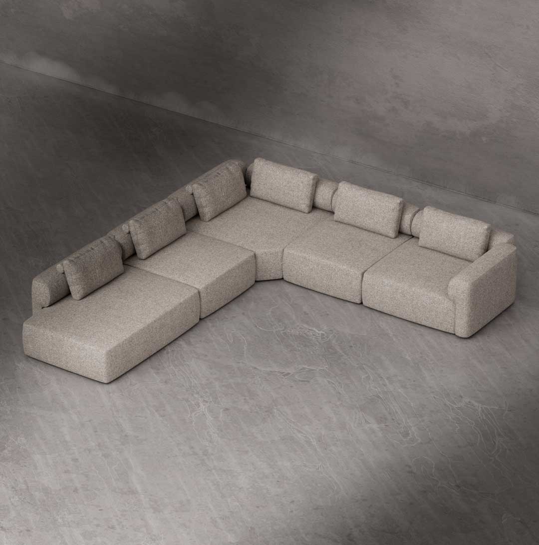 Luxury modular corner sofa in L-shape configuration with deep seating and clean architectural lines, designed for modern living rooms and premium interiors in Dubai and the UAE.