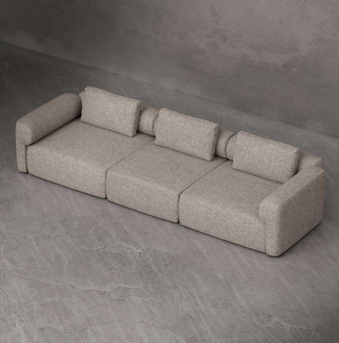 Luxury modular 3-seater sofa in textured fabric with clean architectural lines, deep seating, and structured arms, designed for modern minimalist interiors in Dubai and the UAE.
